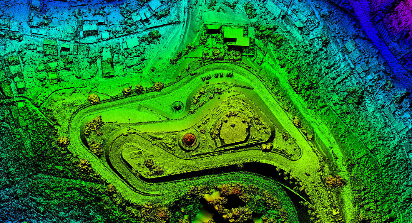 Digital terrain model depicting open land and buildings from above